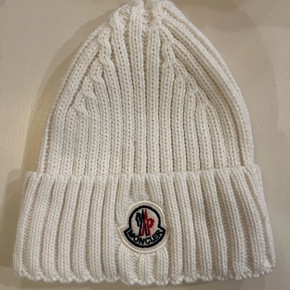 In the Styles of Moncler, Knit Beanie- Used three times the most. No stains.